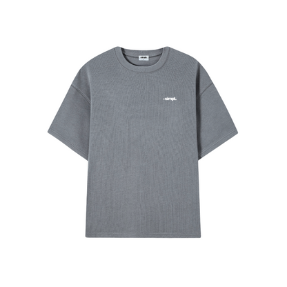 POLERA MAKE IT SIMPL (GRIS ACERO)